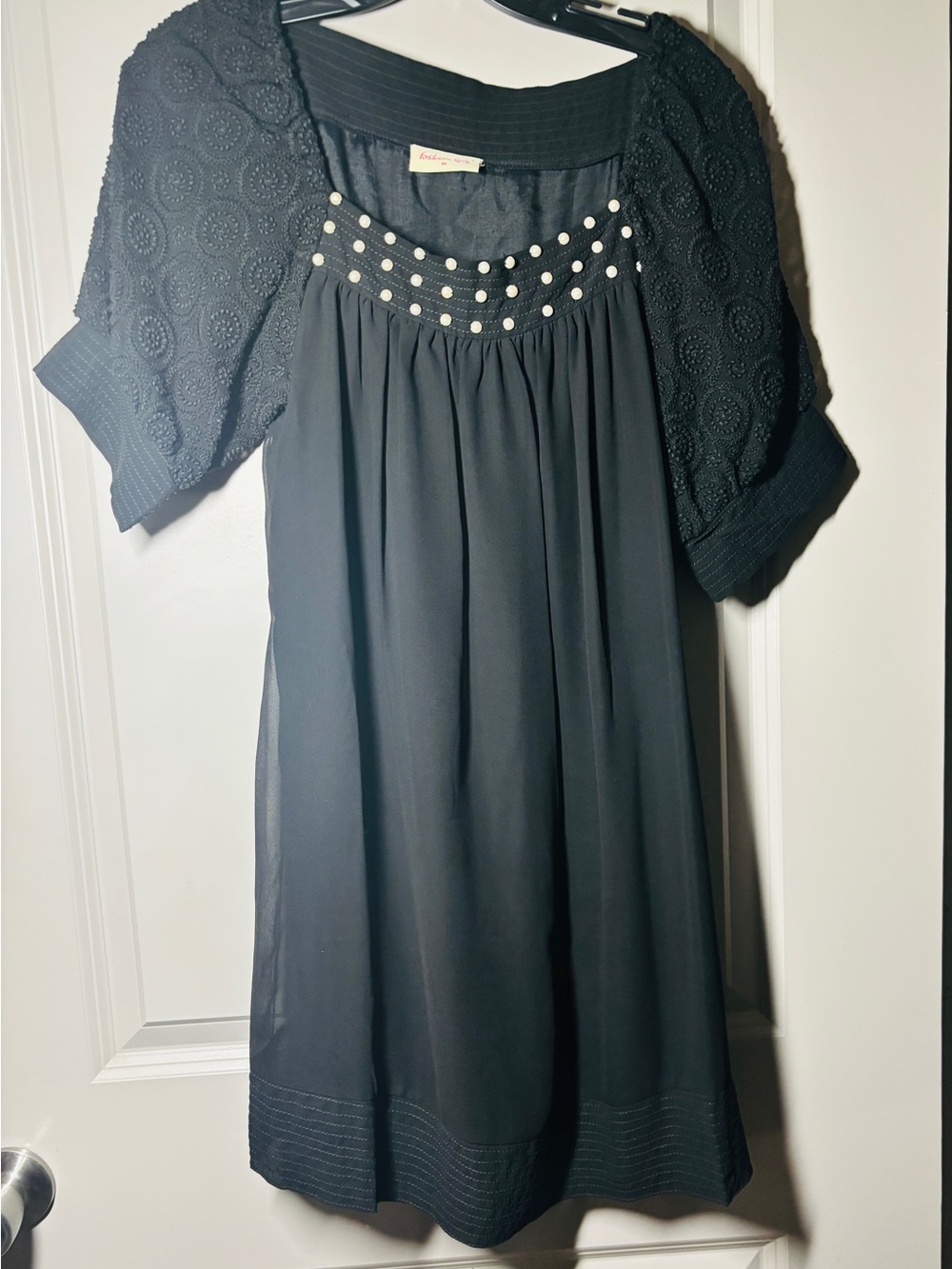 Embellished Black Midi Dress with Textured Sleeves